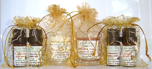  The three wise men Gold organza gift bags,
 with Frankincense and Myrrh, Cinnamon and Orange, essential oils and candles. 